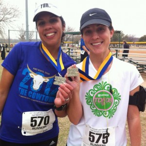 WIth our finisher medals.  So proud.